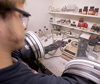 A student using speciality chemistry equipment. 