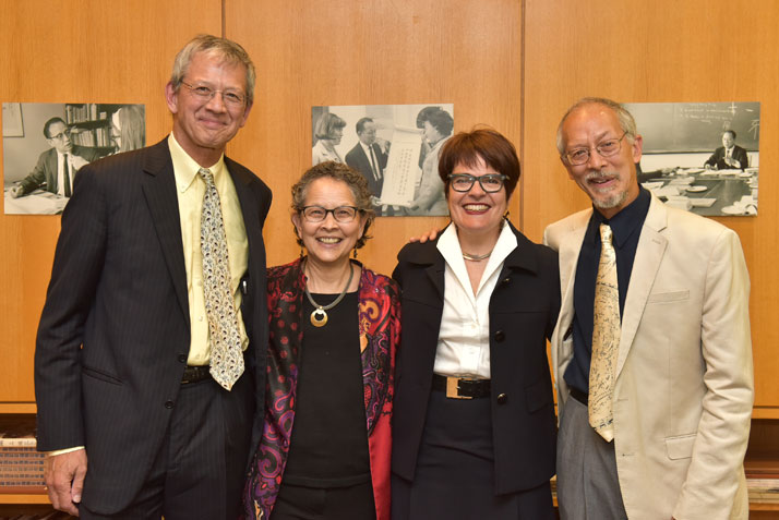 President Bergeron with Charles Chu's children, L-R: Judge Leeland Cole-Chu, Paula Chu and Kevin Chu who presented the College with the handscroll by Chu, 400 Miles of the Connecticut River