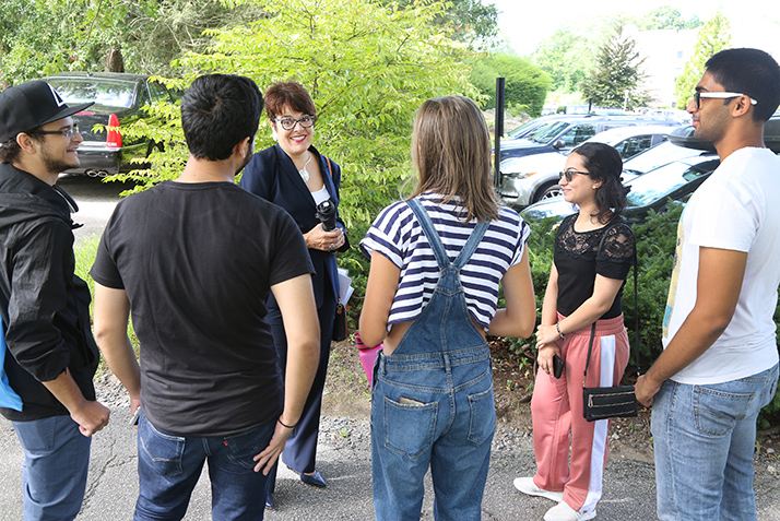 President Katherine Bergeron talks to a group of incoming students. 