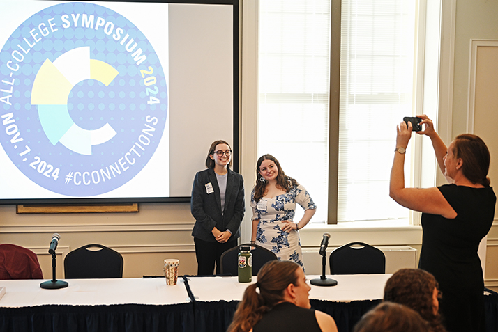 Students pose for a photo during the Symposium.